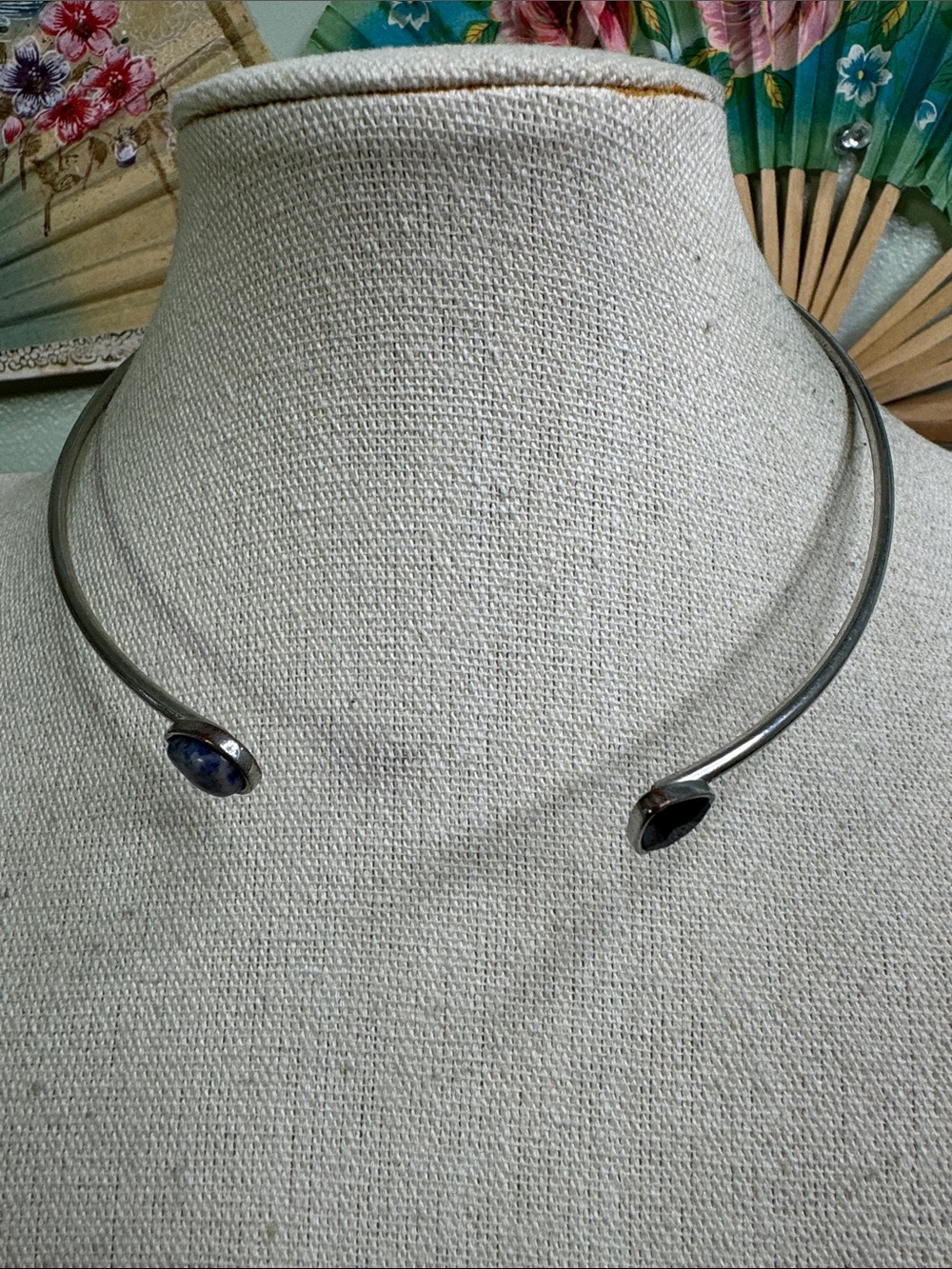 Open Silver Choker Necklace with Black and Blue Stone Ends